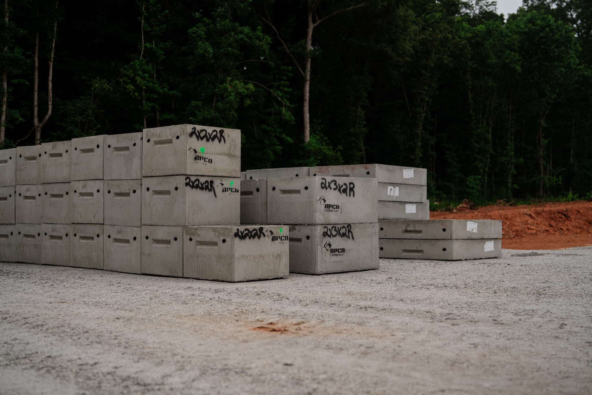 Precast boxes stacked in the Upstate Precast yard